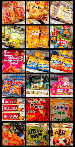 A dense shelf of Korean and Japanese snack packets in bright packaging